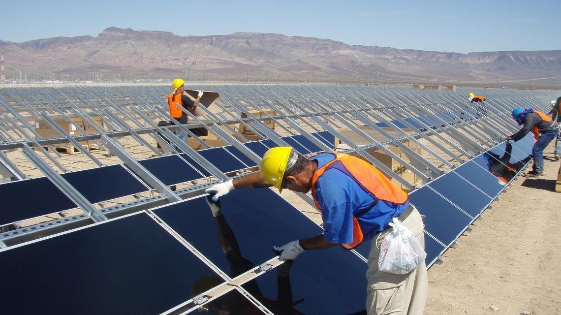 Sempra team members construct the company's first solar panel field on Copper Mountain in Boulder City, Nevada, USA